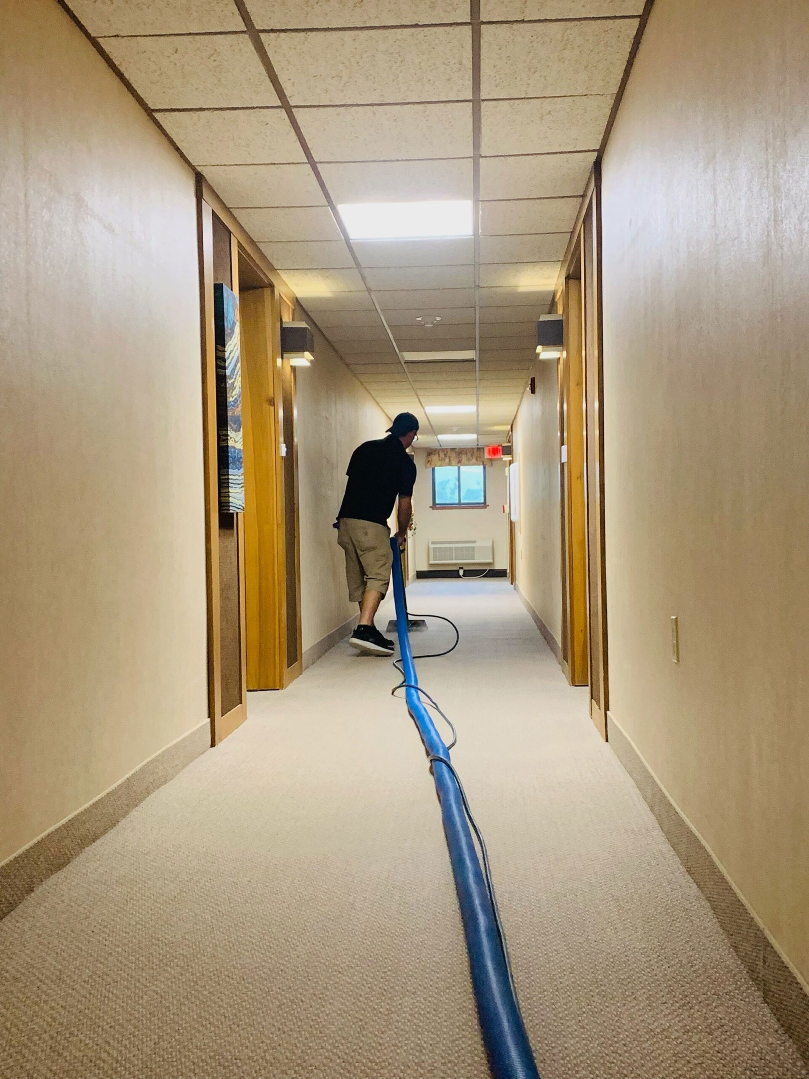 Hallway and high-traffic lane being deep cleaned.